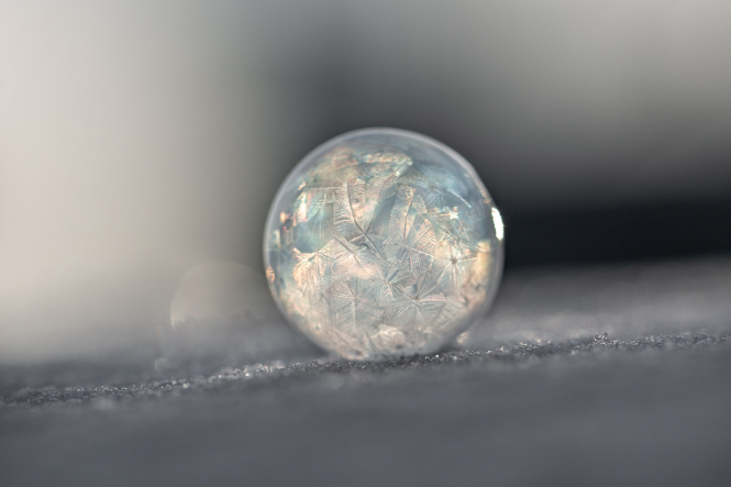 “Frozen soap bubble in the snow, St Paul Minnesota” by Lorie Shaull